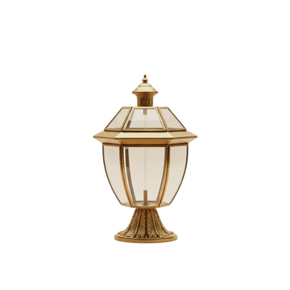 Decorative outdoor lamp with gold finish on a white background