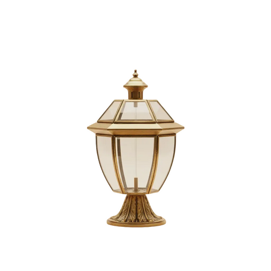 Decorative outdoor lamp with gold finish on a white background